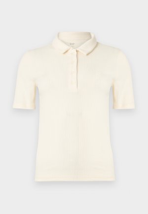Kurzärmliges geripptes cremefarbenes Poloshirt mit Kragen und Vier-Knopf-Leiste vorne, flach auf einem einfarbigen Hintergrund ausgelegt.