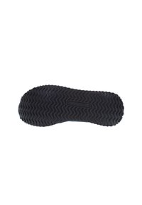 Suola di scarpa nera con una texture ondulata, caratterizzata da motivi rialzati per una migliore aderenza e un dettaglio del marchio al centro.