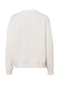 Witte sweatshirt met een losse pasvorm, geribbelde boorden en een gladde textuur. Heeft subtiele accenten aan de zijkanten voor extra designdetail.