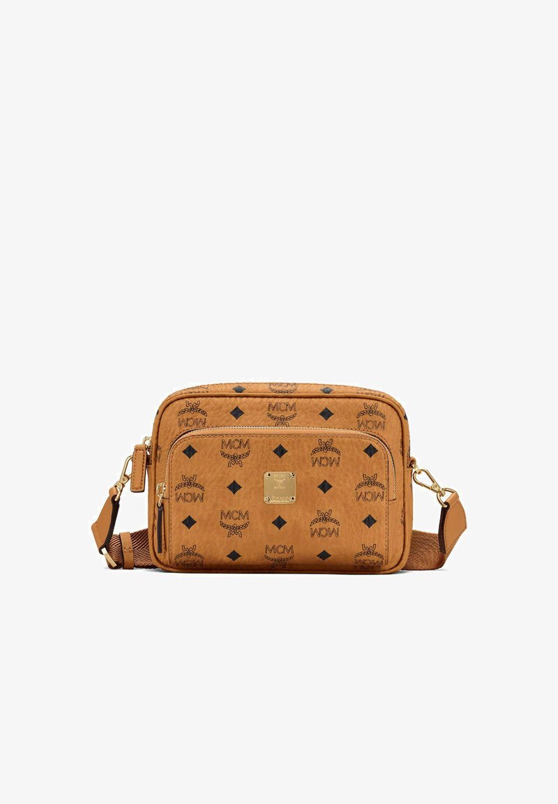 Brown MCM crossbody bag with black logo pattern, front zip pocket, gold hardware, and adjustable strap.
