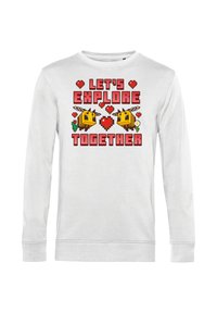 Felpa bianca a maniche lunghe con un grafiche giocoso di due api pixelate, cuori e il testo "ESPLORIAMO INSIEME" in colori vivaci.