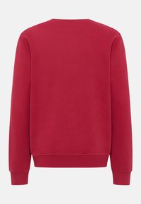 Rode sweatshirt met een ronde hals, lange mouwen en geribbelde manchetten. Glad van textuur, ontspannen pasvorm, geen zichtbare logo's of patronen.