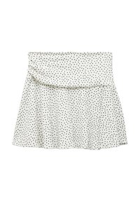 Gonna bianca con pois neri, caratterizzata da una vita arricciata e un orlo svasato. Realizzata in tessuto morbido, presenta una texture liscia.