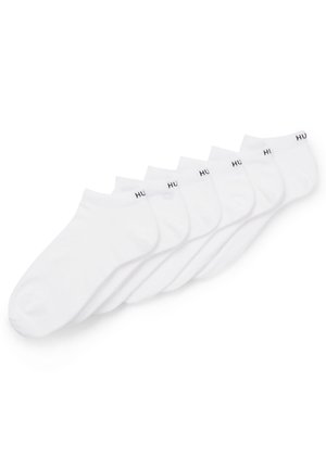 Set of five white ankle socks made from cotton blend, featuring a smooth texture and a black logo on the cuff.