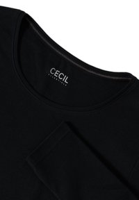 Zwarte longsleeve shirt van zacht katoen met een ronde hals en gestikte details, voorzien van het "CECIL ESSENTIALS" logo aan de binnenkant.