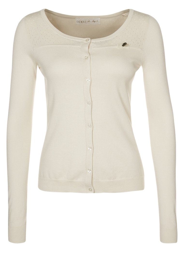 Krémový cardigan s dlouhými rukávy, knoflíkovým zapínáním, texturovanými detaily na ramenech a malou odznakem na levé straně. Měkká pletenina.