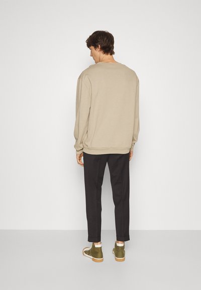 Filippa K TERRY CROPPED TROUSER - Püksid - dark brown