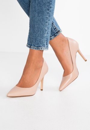 Højhælede pumps - nude