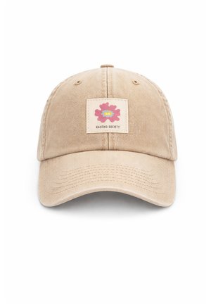 Beezhi pesapalli kork, millel on roosa ja kollane abstraktne lillelapp ning esiküljel keskel kiri "KAOTIKO SOCIETY".