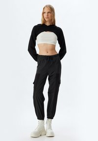 Koton Pantalones cargo - black