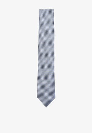 Navy blue tie with a textured pattern of small white diamonds. The fabric has a smooth finish, tapering to a pointed tip.