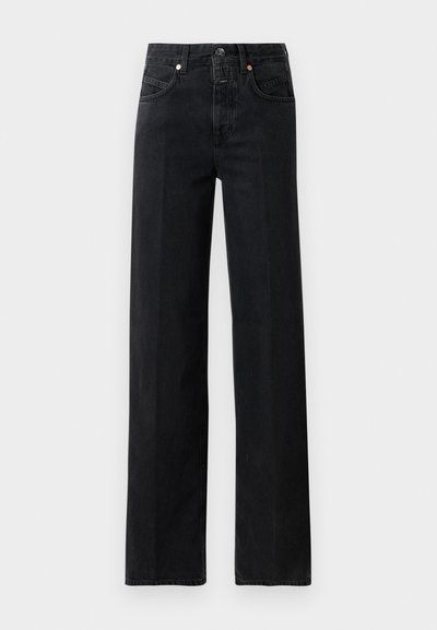 Musta denim-housut suoralla lahkeella. Ominaisuuksiin kuuluvat viisi taskua, nappikiinnitys ja minimaaliset ompeluyksityiskohdat. Klassinen muotoilu.