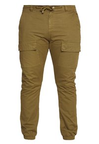 Khaki cargobukser med snøring i livet, elastiske mansjetter og to store sidelommer. Laget av lett stoff med en glatt tekstur.