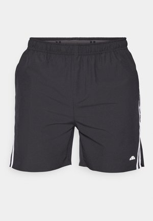 Fekete sportos rövidnadrág, rugalmas derékkal, fehér oldalsávokkal és kis logóval a jobb alsó lábszáron. Könnyű anyag.