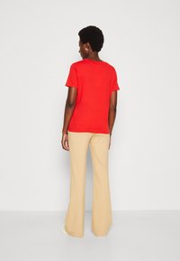 Tommy Hilfiger LOGO - Print T-shirt - fireworks