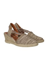 Beige espadrille wedge schoenen met een ribbelstof bovenwerk, rubberen zool en kruislings bandjes aan de achterkant. Geweven jute tussenzool voegt textuur toe.
