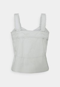 Débardeur gris clair en coton, avec un bord en dentelle festonnée le long des bretelles et du décolleté, doté d'un buste ajusté et d'une taille évasée.