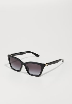 Black rectangular sunglasses with gradient lenses. Thick plastic frame, slightly textured finish, and gold-tone accents at the hinges.