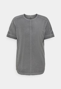 Szara koszulka Dri-FIT z okrągłym dekoltem, krótkimi rękawami, kontrastowym przeszyciem i luźnym krojem. Miękka faktura o gładkim wykończeniu.