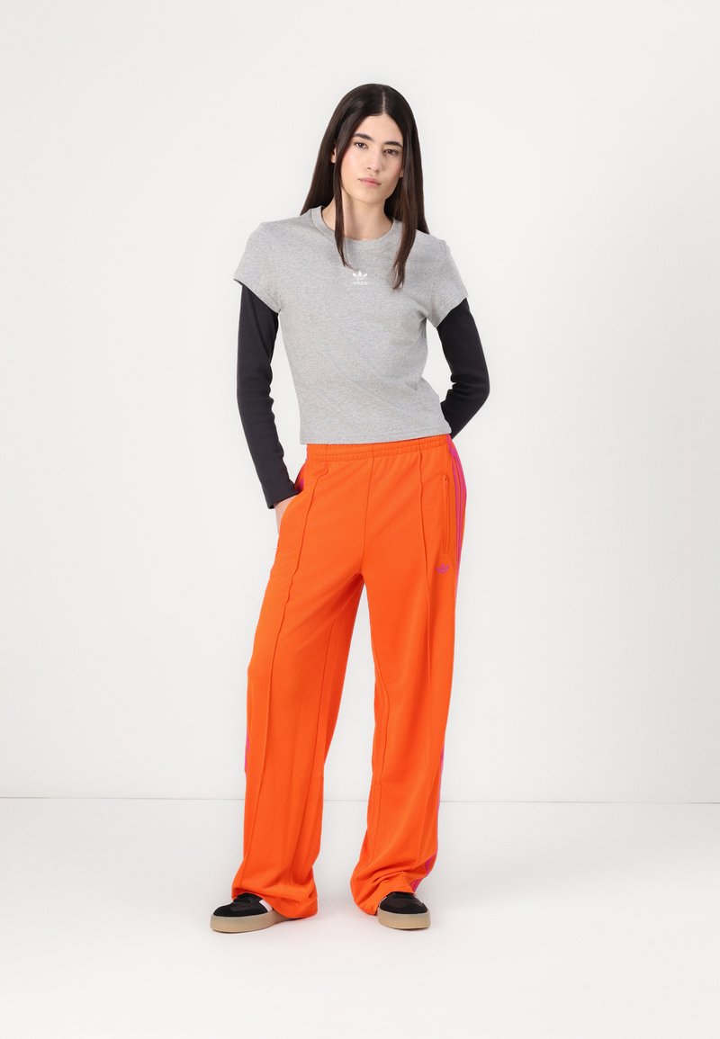 adidas Originals FIREBIRD Pantaloni sportivi orange/semi lucid