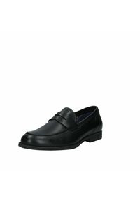 Mocasines de cuero negro con una banda frontal elevada y detalle de costura; punta redondeada y tacón rectangular bajo; textura suave.
