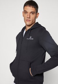 Sergio Tacchini CIPRESSO HOODIE SWEATER - Majica s kapuljačom i patentnim zatvaračem - black/white