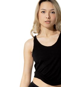 Black sleeveless tank top with a rounded neckline and gathered detail at the waist, made of a soft, smooth fabric.