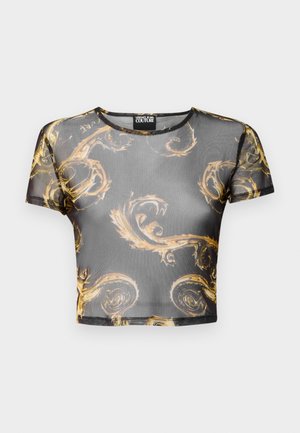 Kortermet, cropped topp i gjennomsiktig svart mesh med intrikate gullsvingmønstre og rund halslinning. Svært myk tekstur og tettsittende design.