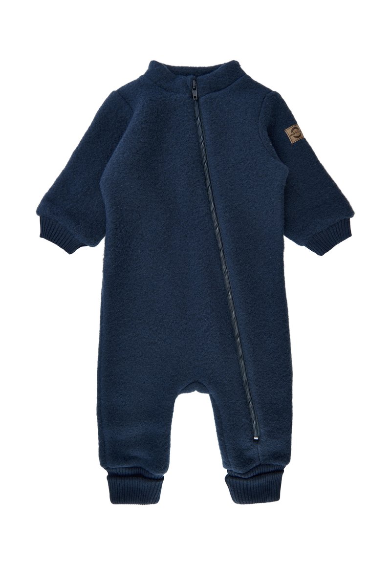 Monosuit de lana polar en color marino con cuello alto, cierre de cremallera y puños acanalados. Textura suave y diseño ligero, adecuado para el clima más fresco.
