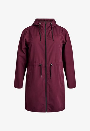 Veinipunase veekindel jope kinnitusnööriga kapuutsi, ees tõmblukuga ja elastse vöökohaga. Pikad varrukad ja küljetaskud. Sile tekstuur.