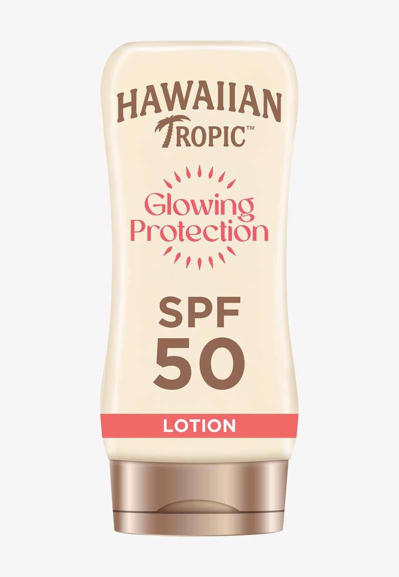 Hawaiian Tropic Glowing Protection SPF 50 lotion in een beige knijpfles met een bruine dop en een rode accentband.