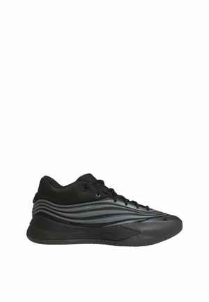 Czarny niski sportowy sneaker z falistymi szarymi paskami, sznurowaniem i teksturowaną podeszwą, pokazany od wewnętrznej strony na białym tle.