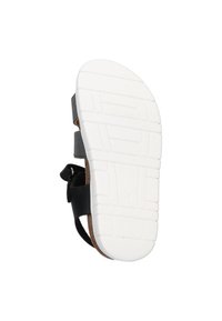 Sort sandal med justerbare remme, korklignende sål og en hvid gummisål med et mønster for greb og støtte.