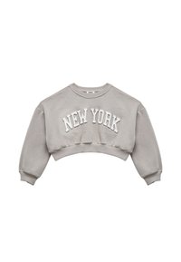 Harmaa lyhythihainen huppari, jossa on "NEW YORK" valkoisin kirjaimin rinnassa. Ominaisuuksina pyöreä kaula-aukko ja ribbauskudot. Pehmeää puuvillakangasta.