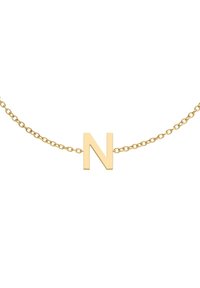 Kuldne kaelakee, millel on lame, poleeritud tähe "N" ripats. Lihtne disain delikaatse, omavahel seotud ahelate tekstuuriga.