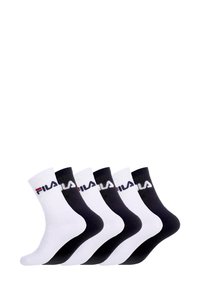 Lot de six paires de chaussettes de cheville blanches et noires. Le matériau est un tricot doux avec une texture côtelée. Présente le logo Fila dans des couleurs contrastées.