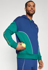 Mizuno ATHLETICS JACKET Felpa con zip estate blue/blu - Main Image