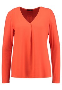 Camiseta de manga larga en naranja brillante, con escote en V y un sutil detalle de drapeado en el pecho. Confeccionada en tejido ligero y suave.