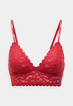Rode kanten bralette met golvende randen, verstelbare bandjes en een logo-label op de band. Heeft een bloemenpatroon en een mesh-textuur.