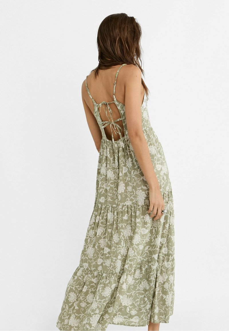green emerald velvet dress Andean Mythology Dress - Spring Summer '26 main image 0