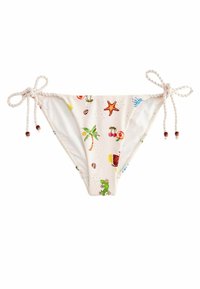 Bikini-Hose in Creme mit einem tropischen Muster, das Palmen, Früchte und Seesterne zeigt. Verstellbare Bindebänder an jeder Seite mit Perlen-Akzenten.