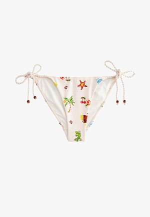 Bikini-Hose in Creme mit einem tropischen Muster, das Palmen, Früchte und Seesterne zeigt. Verstellbare Bindebänder an jeder Seite mit Perlen-Akzenten.