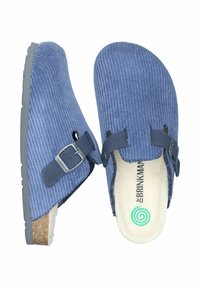 Blue corduroy clogs with a cork footbed, black straps, metal buckles, and a textured surface. Rubber soles provide slip resistance.