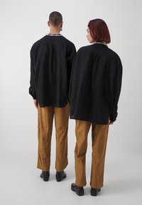 Sister Jane CLAY PATCHWORK TROUSERS UNISEX - Housut - tan