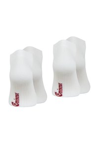 Chaussettes de sport blanches avec texture côtelée, arborant un logo rouge sur le côté. Design à mi-mollet, adapté pour le sport et le port décontracté.