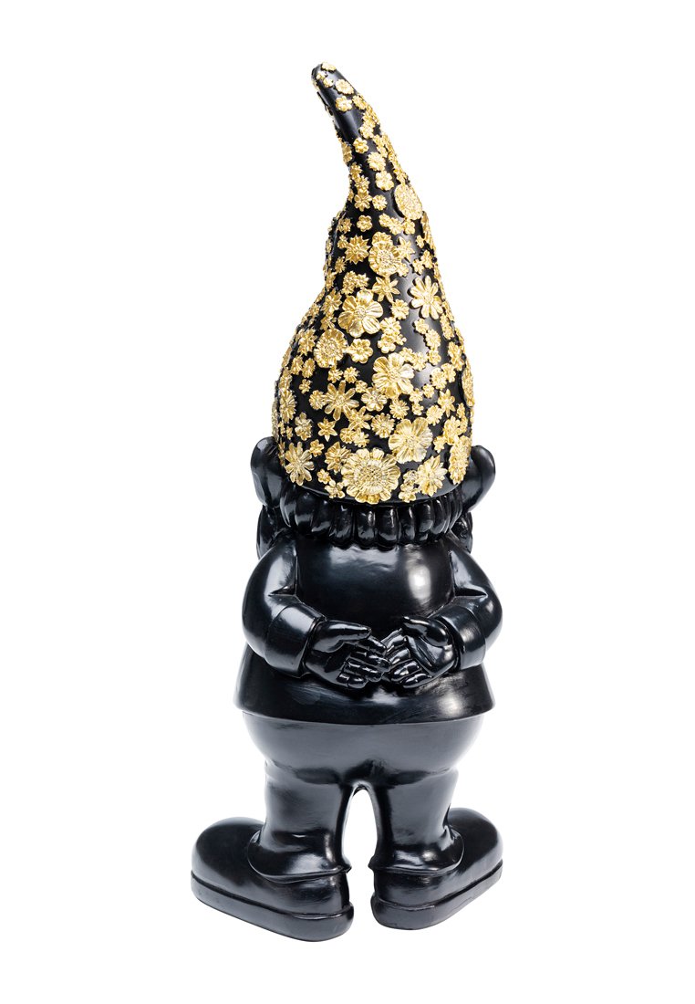 Figurine de nain en céramique noire avec un chapeau pointu orné d'un motif floral doré, des mains détaillées jointes à l'avant, surface lisse, finition brillante.