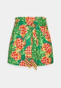 Kolorowa mini spódniczka z żywym tropikalnym nadrukiem ananasa w żółtym i czerwonym kolorze na zielonym tle, z wiązaniem w pasie i koralikowymi detalami.