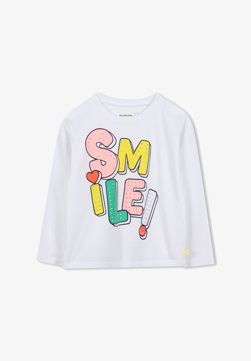 Weißes langärmeliges T-Shirt mit buntem, übergroßem "SMILE!"-Grafikdesign, das mit einem roten Herzen und gepunkteten Akzenten verziert ist. Aus weichem Baumwollmaterial.