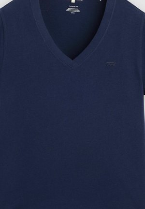 Navy blue V-neck short-sleeve cotton T-shirt with small Levi's logo on left chest and size label inside neckline.