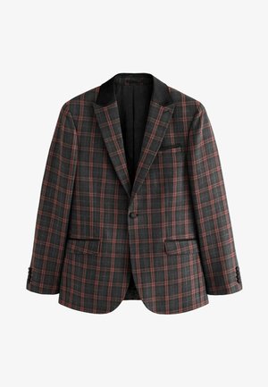 Musta ja harmaa ruutujakki punaisilla yksityiskohdilla, yksinäinen nappisulku, kaksi etutaskua ja viistetyt läpät. Pehmeä teksturoitu kangas.